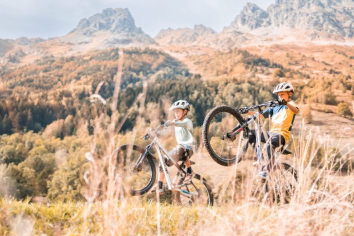 Boys mountain biking in the French Alps