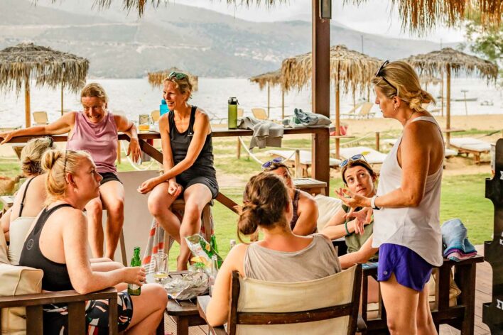 Group of women enjoying a beach bar