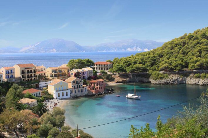 View of Asos. Kefalonia with colourful buildings around a natural harbour